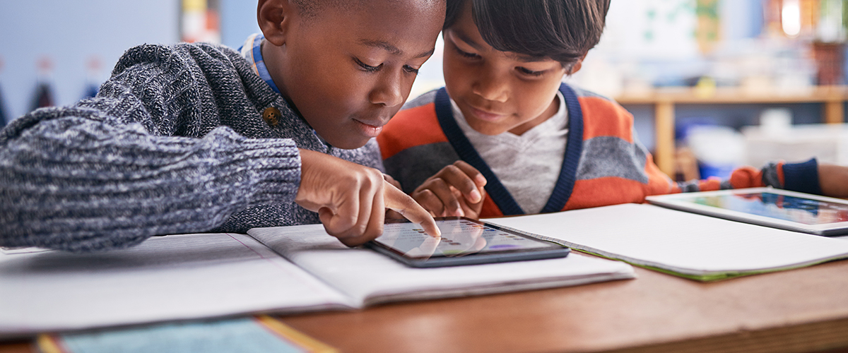 Digital Tablet, School And Students In Classroom Doing Research For Work, Test Or Exam. Technology, Education And Boy Children Friends Working On Project Or Assignment Together With Mobile On Campus.