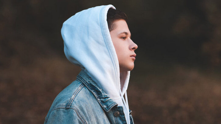Handsometeenboy15 16yearoldwearingdenimjacketandwhitehoodiestandingoutdoorsovernatureautumnbackground.teenagerhood Cropped